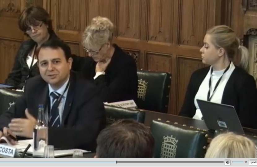 Alberto Costa MP is pictured asking questions at the hearing