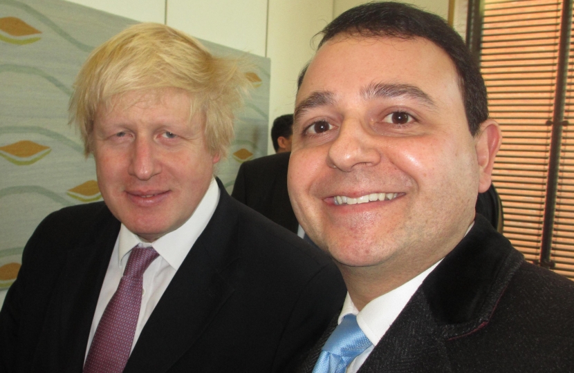 Alberto is pictured with Boris Johnson.