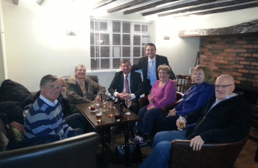 Alberto is pictured with Leire residents in the Queens Arms.
