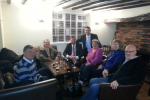 Alberto is pictured with Leire residents in the Queens Arms.